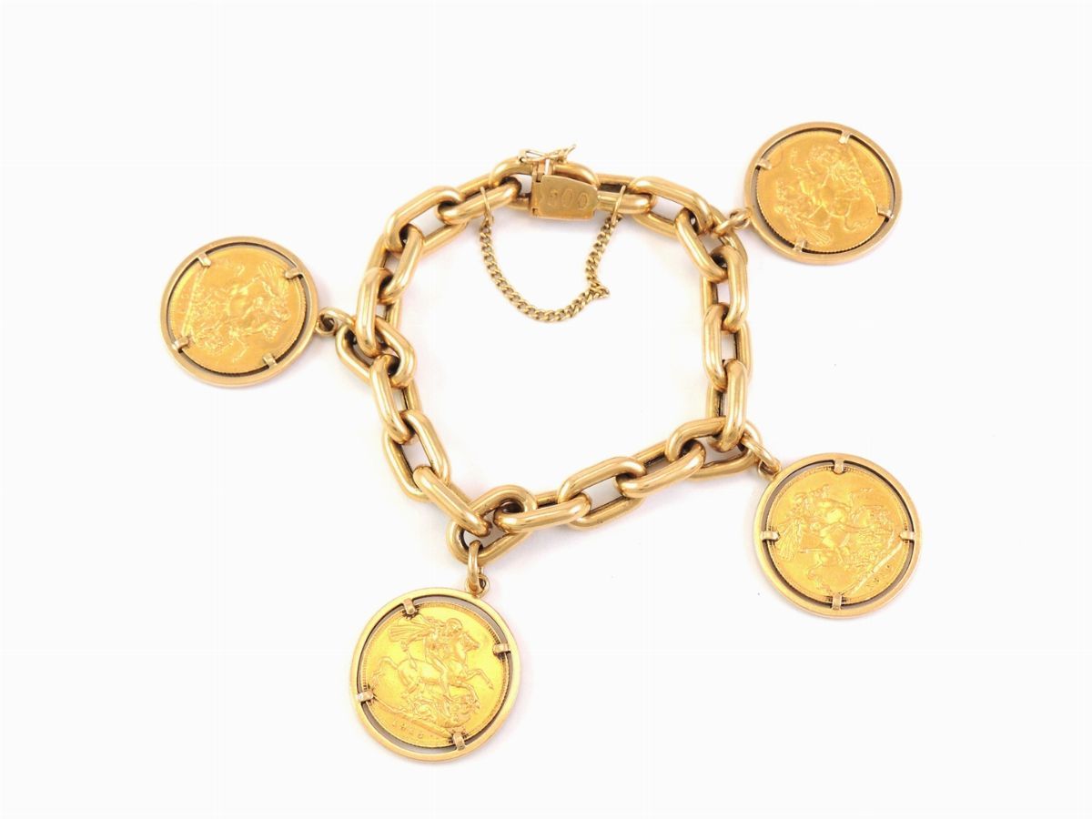 Bracciale in Oro Giallo con Quattro Monete Pendenti