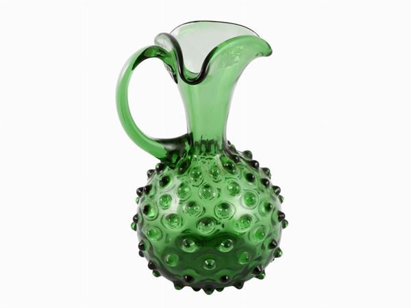A Bugnato green glass pitcher
