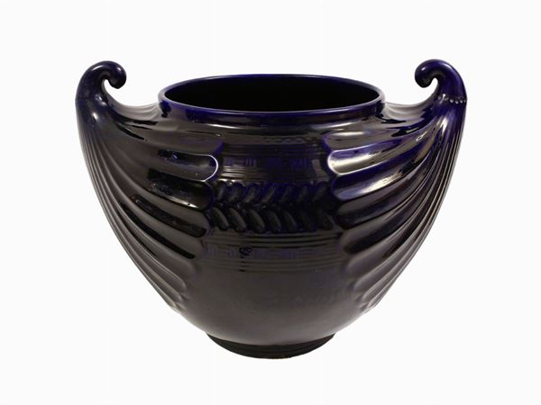 A larce blue ceramic cachepot