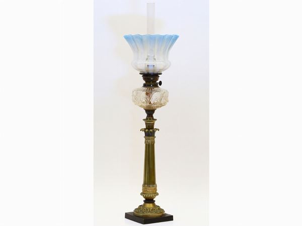 A metal oil lamp