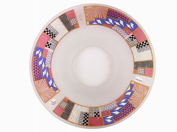 A milk colour glass plate with geometrical design
