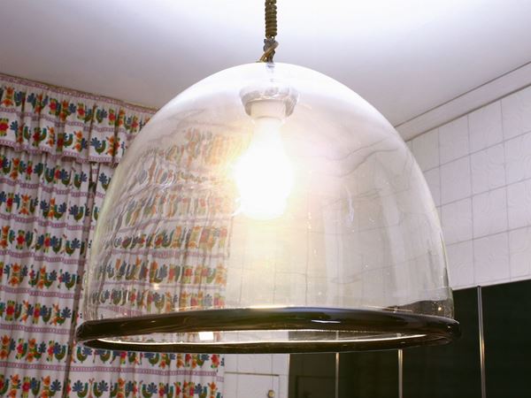 A blown glass ceiling lamp