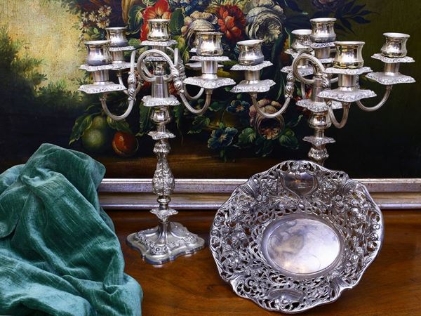 Two silver metal candlesticks and a bascket  - Auction The florentine house of the soprano Marcella Tassi - Maison Bibelot - Casa d'Aste Firenze - Milano