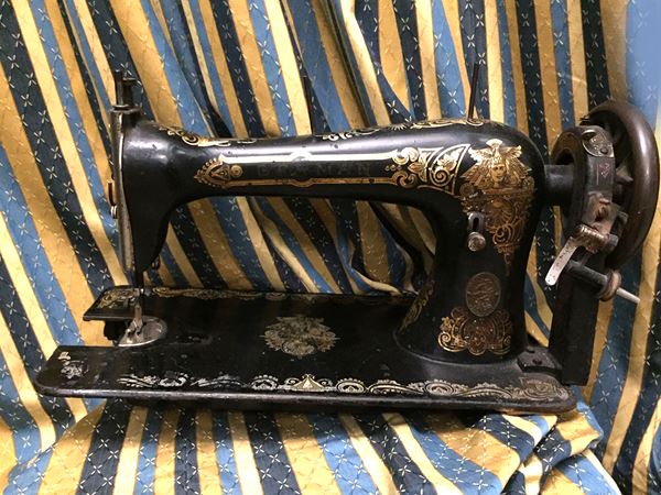 A vintage cast iron sewing machine
