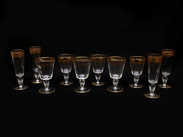 Servito di bicchieri in cristallo lumeggiati in oro  - Asta La casa fiorentina del soprano Marcella Tassi - Maison Bibelot - Casa d'Aste Firenze - Milano