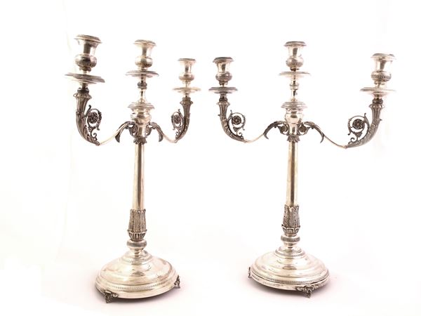 A pair of silver candlestick