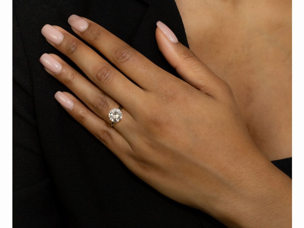 Anello Solitario in Oro Bianco con Diamante