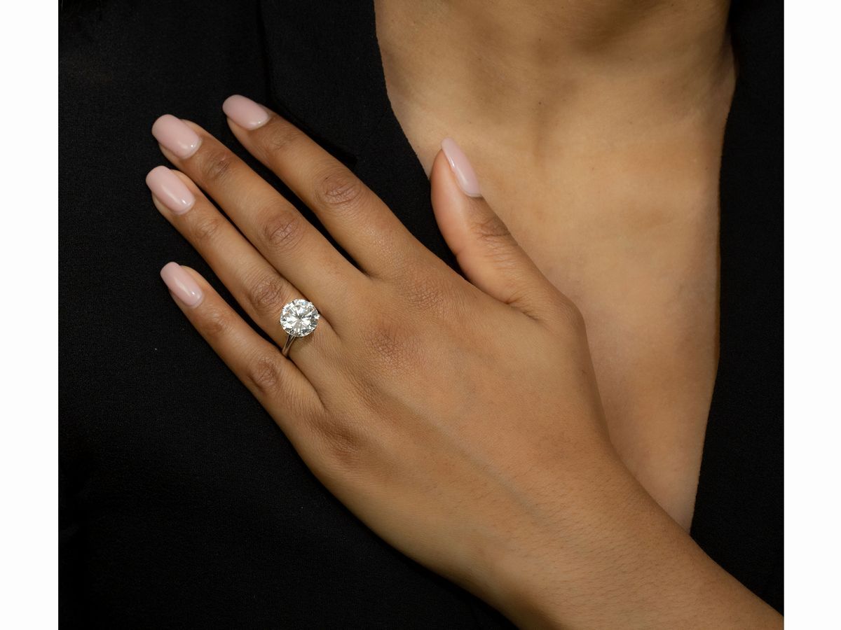 Anello Solitario in Oro Bianco con Diamante