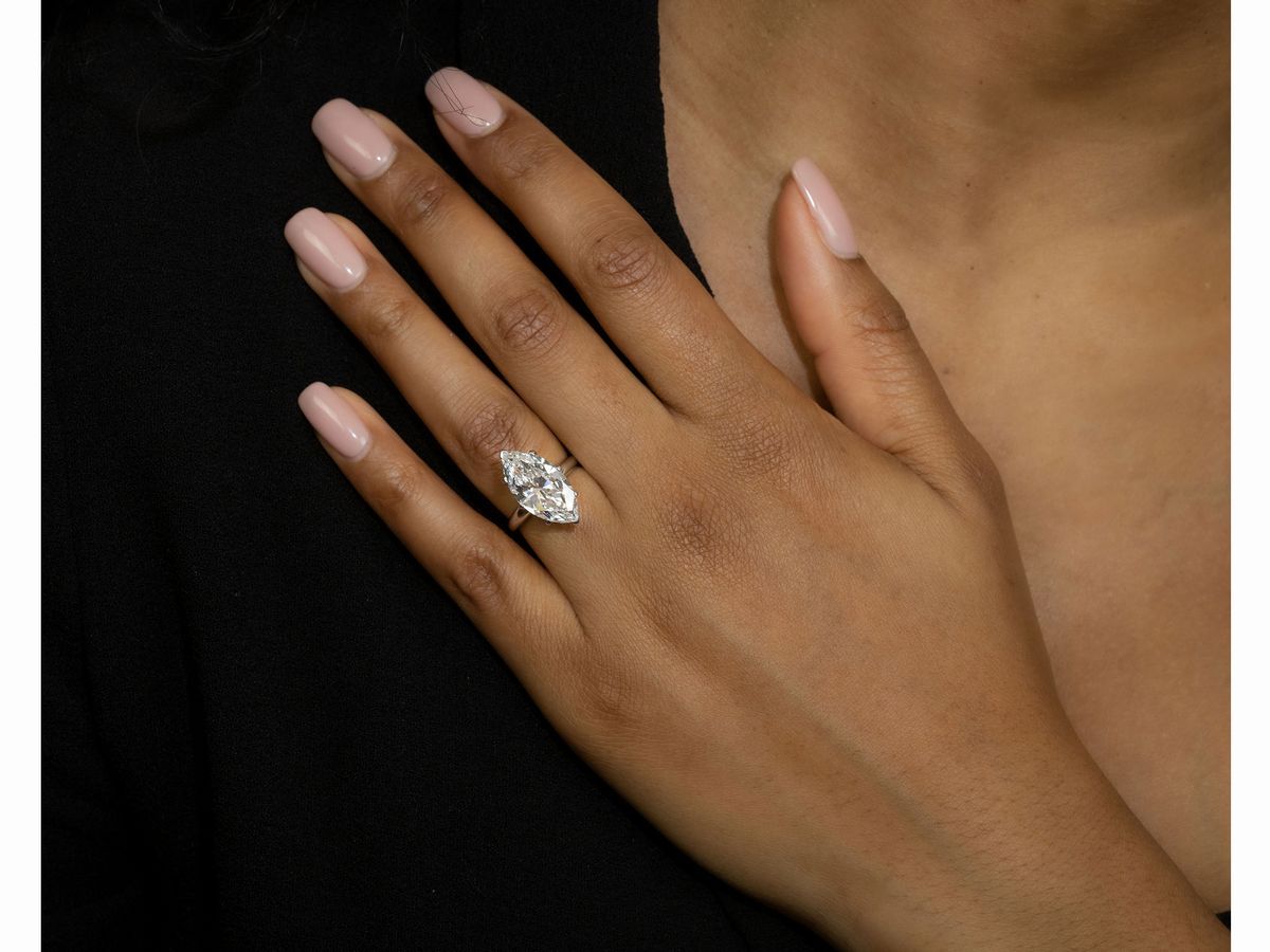 Anello Solitario in Oro Bianco con Diamante