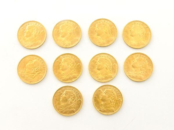 Ten 20 Francs coins