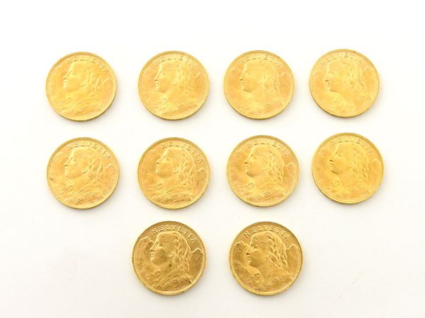 Ten 20 Francs coins