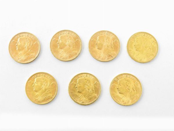 Seven 20 Francs coins