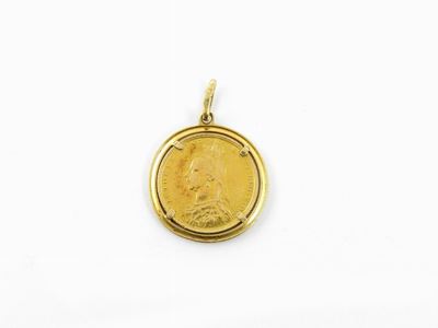 Una Moneta da una Sterlina con Montatura in Oro Giallo