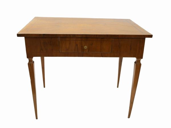 A small walnut veneered writing desk
