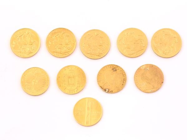 Undici riproduzioni di monete di vari stati in oro a basso titolo
