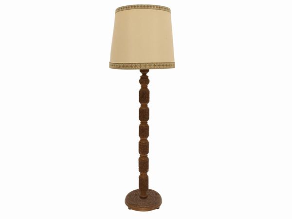 A softwood floor lamp