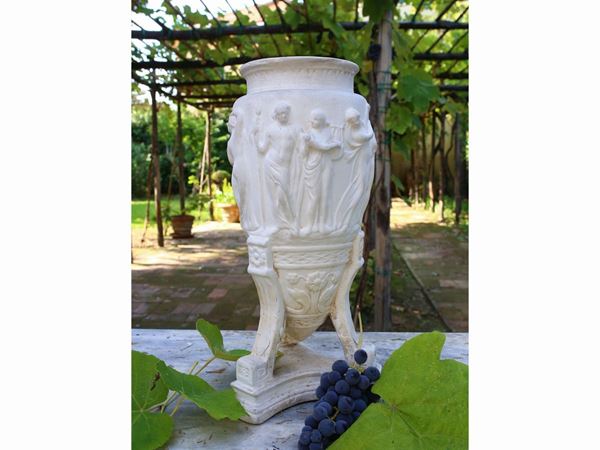 A plaster classical vase