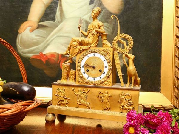 An ormolou table clock