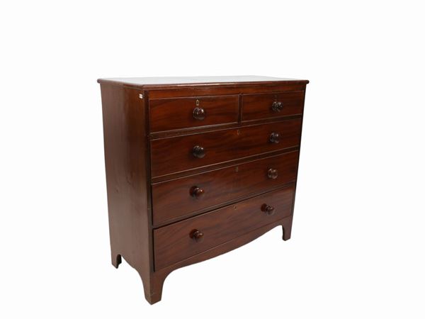 A small mahogany chest of drawers