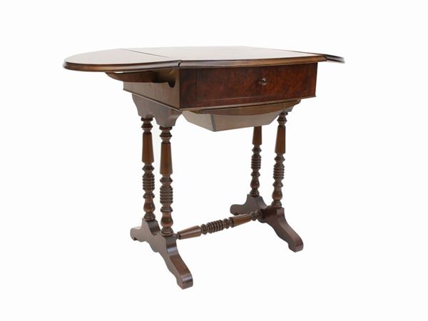 A walnut veneered working table