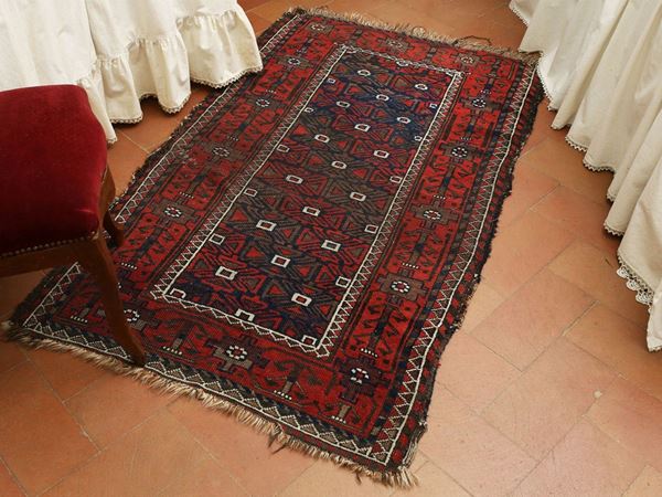 Tre tappeti persiani di vecchia manifattura