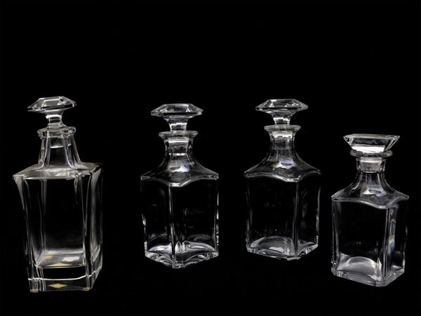 Four crystal liquor bottles