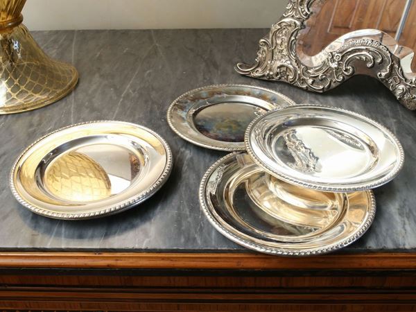 A set of six silver plates