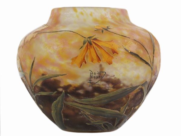 A Daum acid etched cameo glass vase with gazania flowers