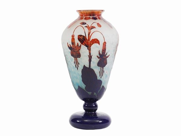 A Le Verre Français cameo glass vase with pink tones acid-etched motif of fuchsias