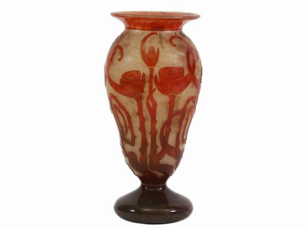 A Le Verre Français mottled yellow and orange glass overlaid with red to green, pattern acid-etched