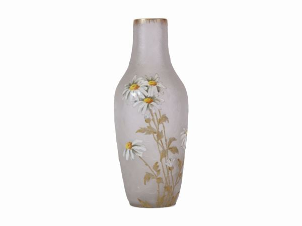 A enamelled blown glass Legras vase with daisies retouched in gold. Not signed