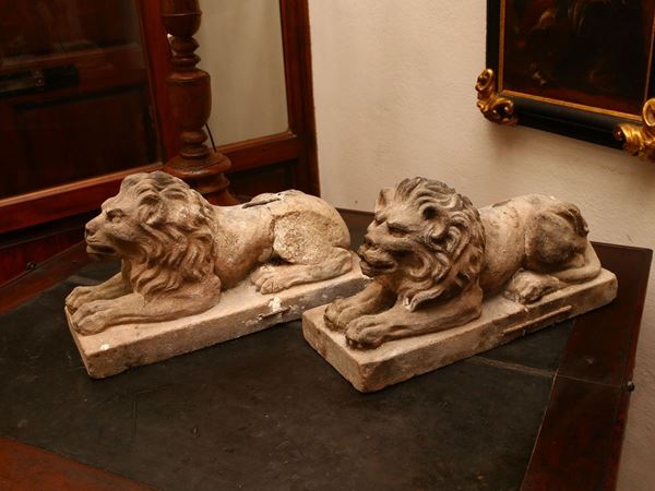 Pair of pietra serena lion sculptures