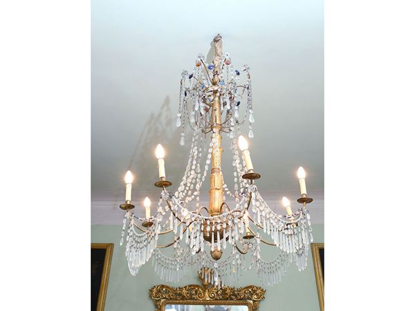 Carved giltwood and crystals Chandelier