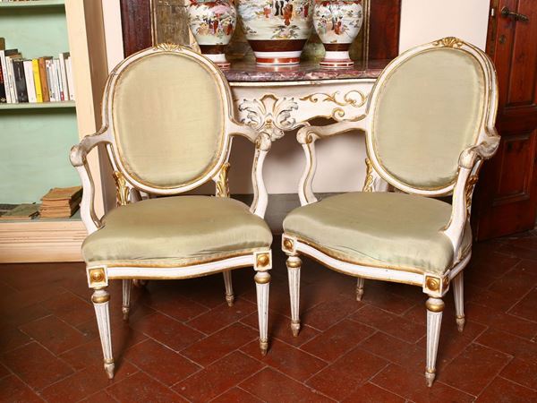 Pair of lacquered and giltwood armchairs