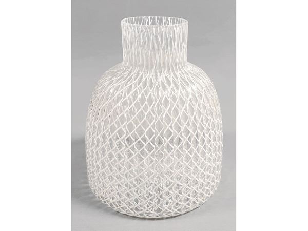 A Venini blown glass vase with a milk reticello filgree decor