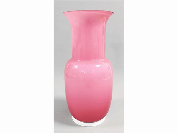 A Venini glass pink and lattimo cased glass vase. Signed Venini