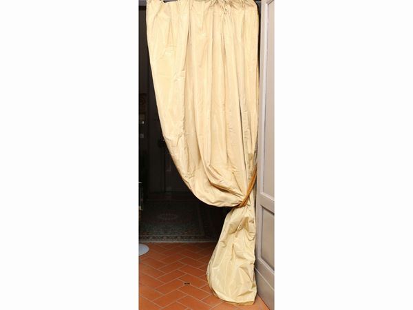 Pair of golden silk curtains