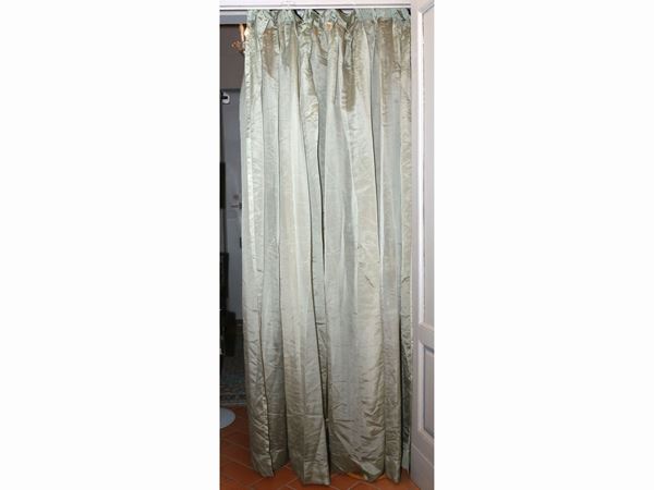 Four green organza curtains