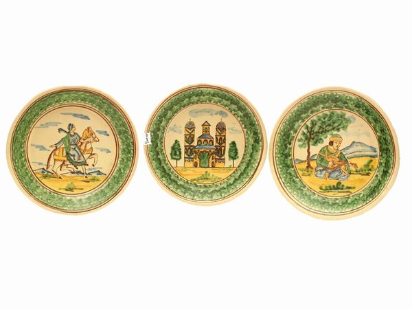 Five decorative plates in glazed terracotta
