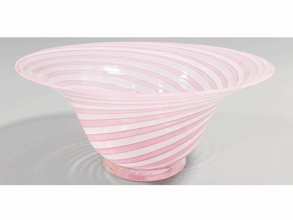 A glass bowl with a pink and lattimo filigree decor. Attributed to Salviati