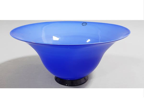A cased blue and light blue centerpiece and blue base applied. Signed Venini1989, original label.  (Murano, 1989)  - Auction The florentine house of a milanese collector: important glasses, objects of art and contemporary art - Maison Bibelot - Casa d'Aste Firenze - Milano