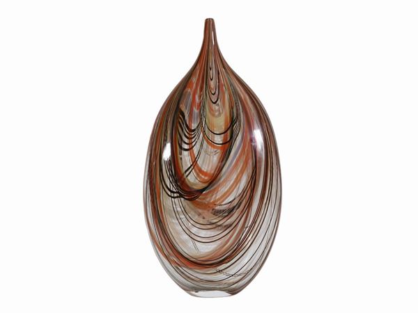 A Murano glass vase with inclusions of polychrome filaments arranged irregularly