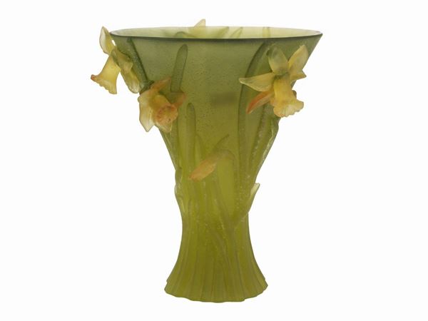 A Daum pate de verre yellow glass vase with narcissus applied while hot.