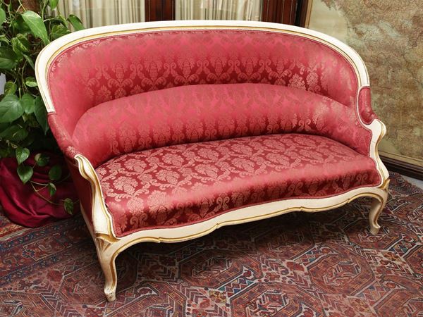 A giltwood and white lacquered sofa  (Tuscany, mid 19th century)  - Auction Furniture from Compagni Palace in Florence - Maison Bibelot - Casa d'Aste Firenze - Milano