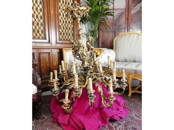 A large guilded metal chandelier