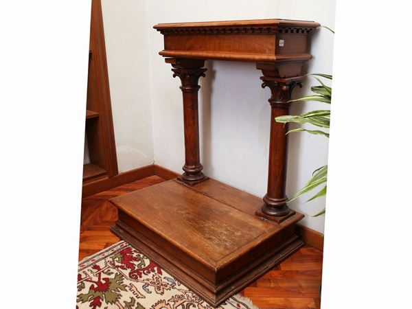 A walnut kneeling stool
