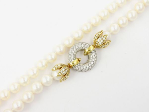 Collana di perle coltivate con fermezza in oro bianco e giallo con diamanti