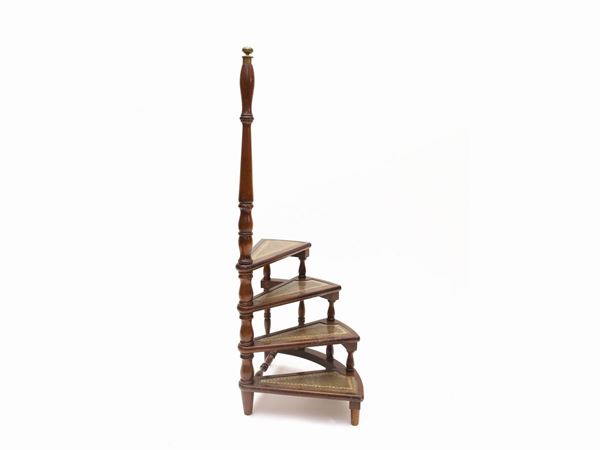 A walnut library ladder
