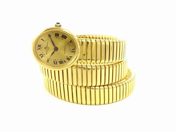 Bracciale tubogas in oro giallo con orologio Baume & Mercier e diamanti