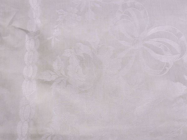 Two ivory linen tablecloths